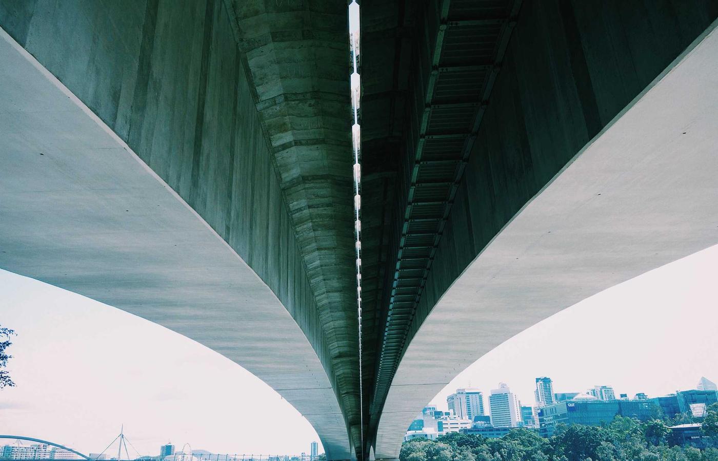 The vast, hexagonal salt formations of the Uyuni Salt Flats curving infinitely toward the horizon