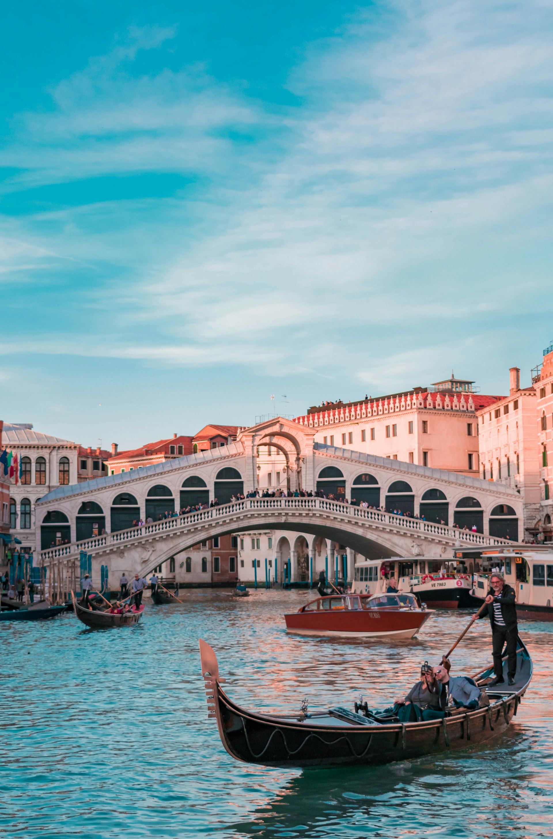 Venice Grand Canal with gondolas and colorful buildings