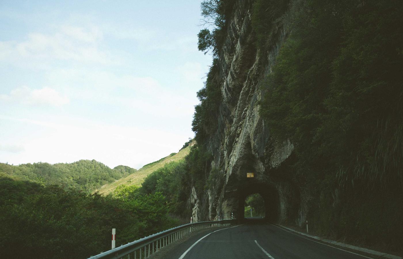 The spectacular, rugged, multi-colored volcanic islands of Padar surrounded by deep blue water