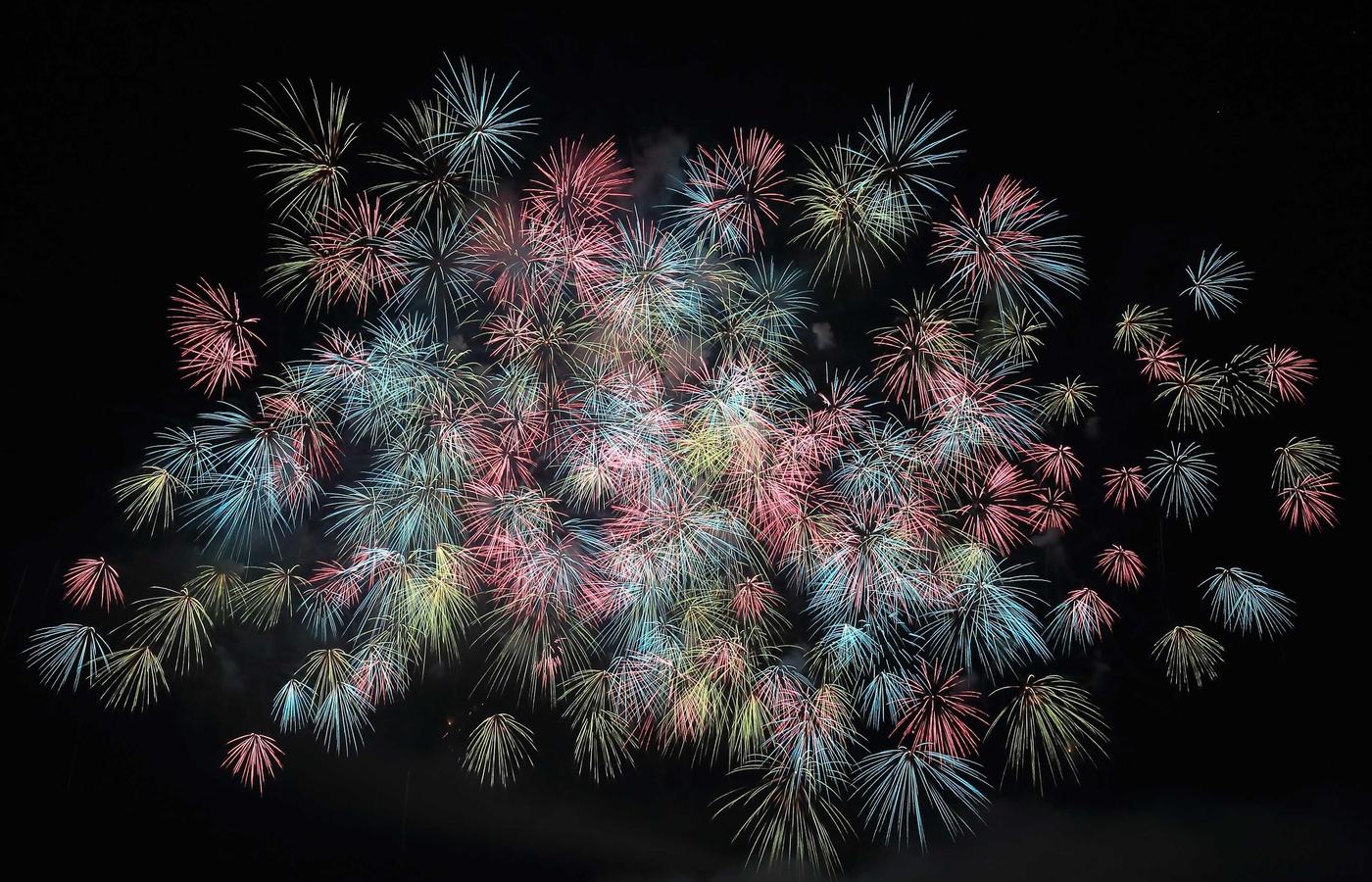 Iconic paraws (sailboats) at sunset on White Beach, Boracay